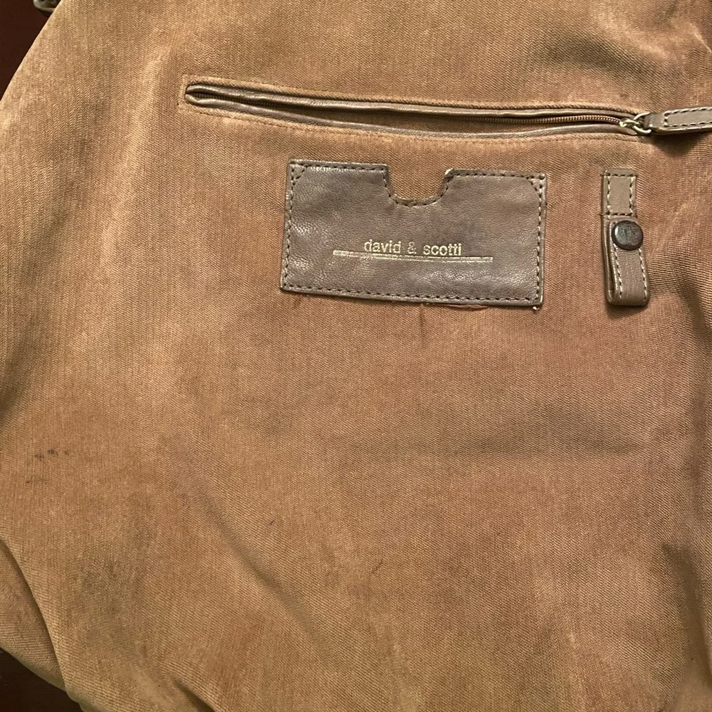 Oversized Gently used Leather Satchel.